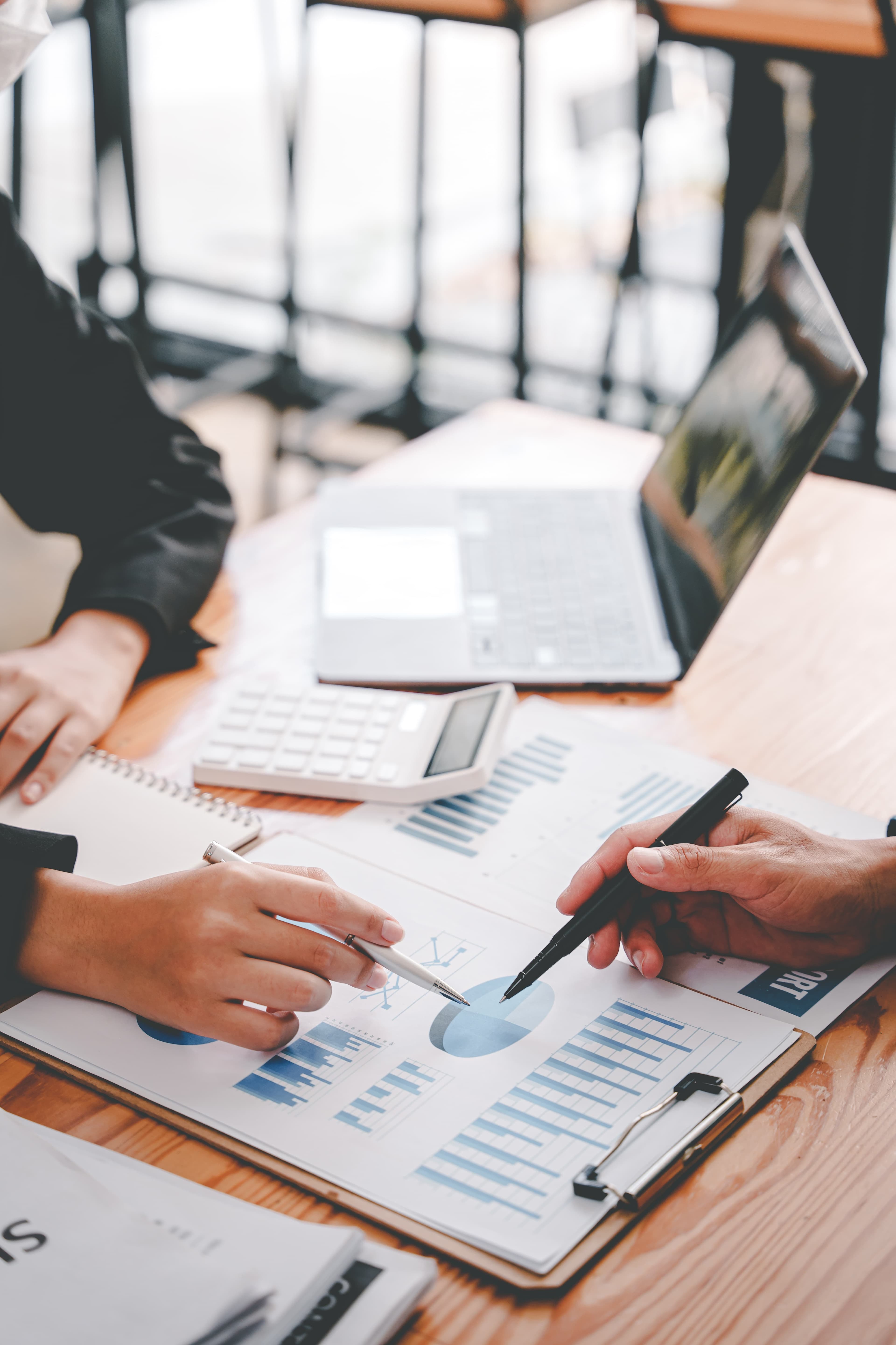 business people observing a graph